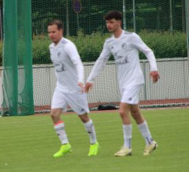 Innige Berührung von Dennis Senn und David Moser?